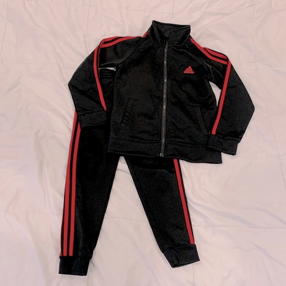 Adidas kids black w/red striped track suit size 6